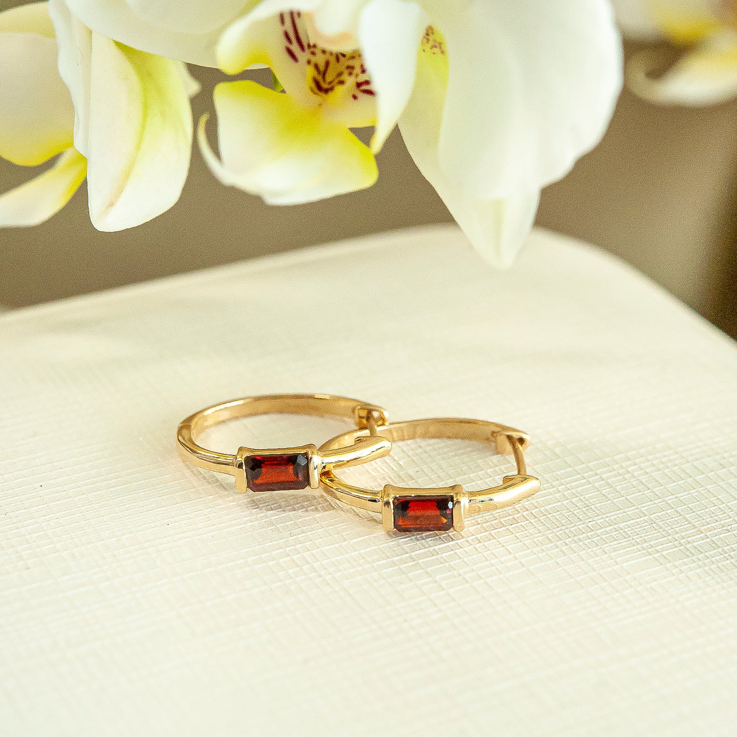 Hazel Single Garnet Gemstone Hoop Earrings In Gold With Ruby Stone