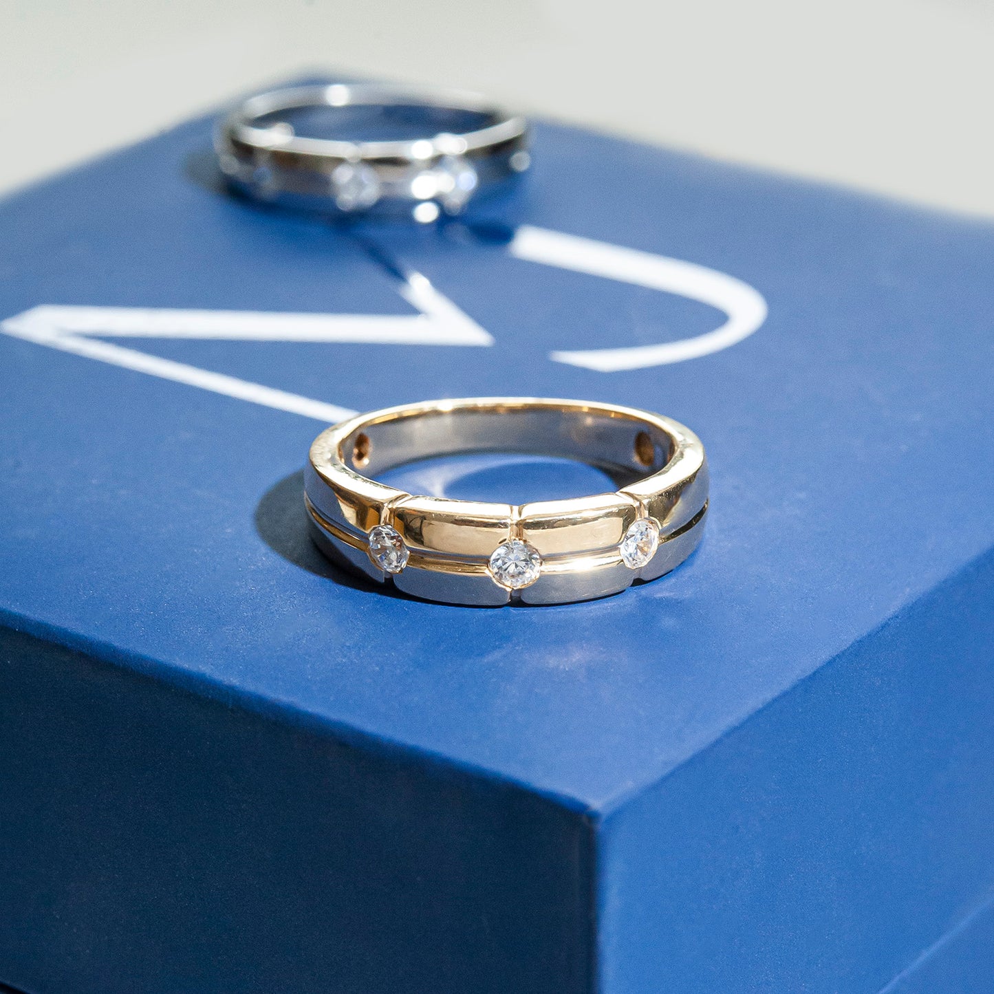 Three Stone Diamond Band in White Gold
