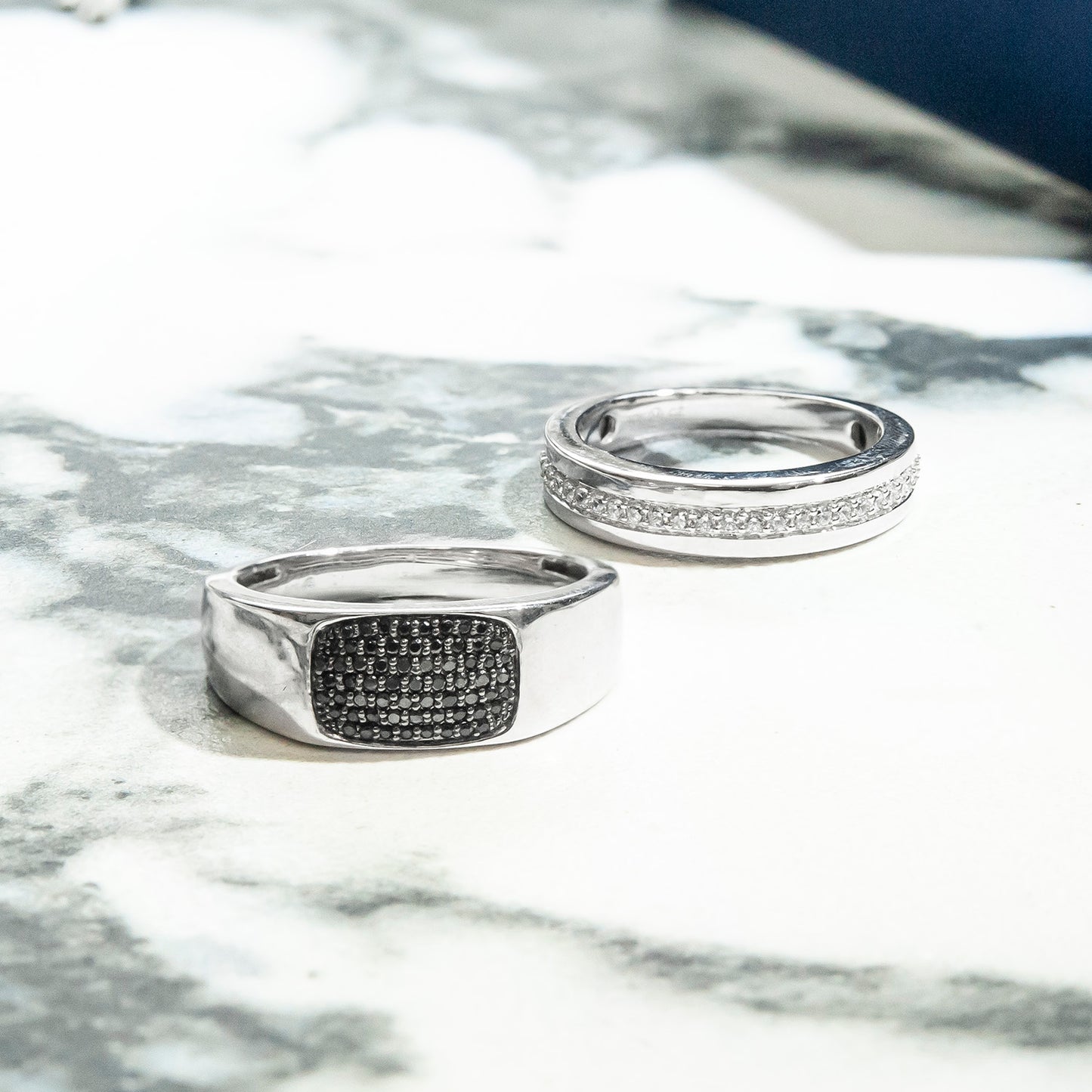 Black Diamond Ring Placed on Table