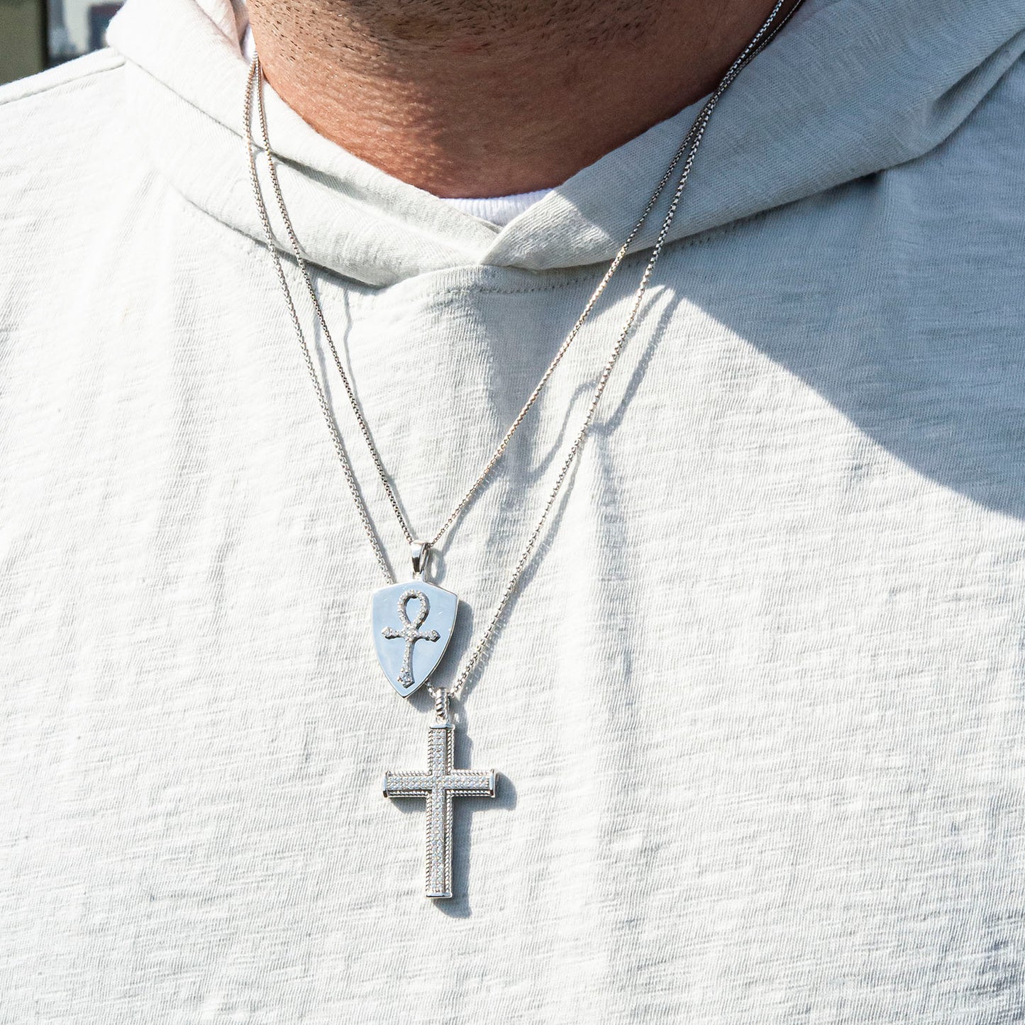 Diamond Cross Pendant Set on T-Shirt