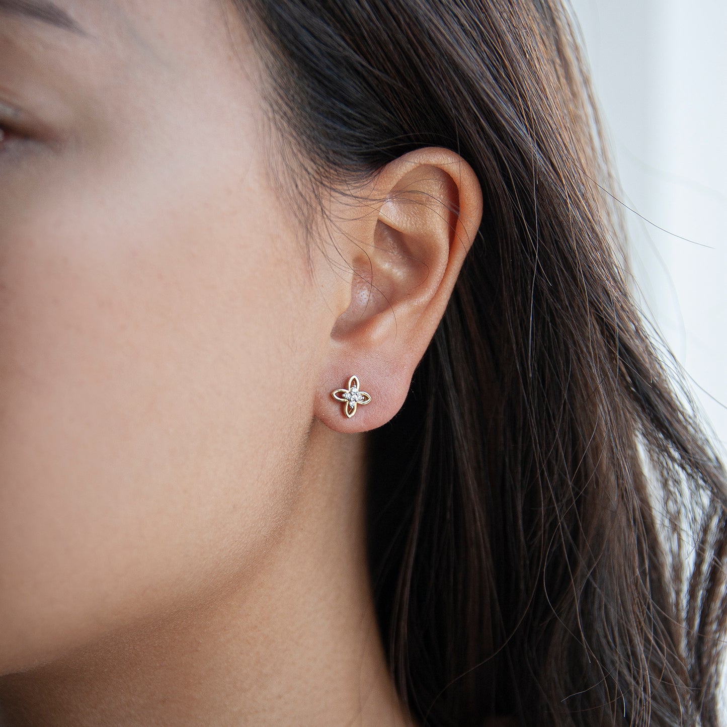 Eve Flower Stud Earrings In Girl Ear