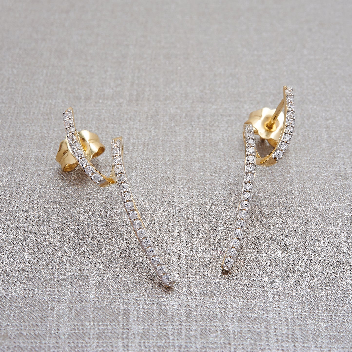 Eddi Diamond Free Form Earrings Placed On Cloth