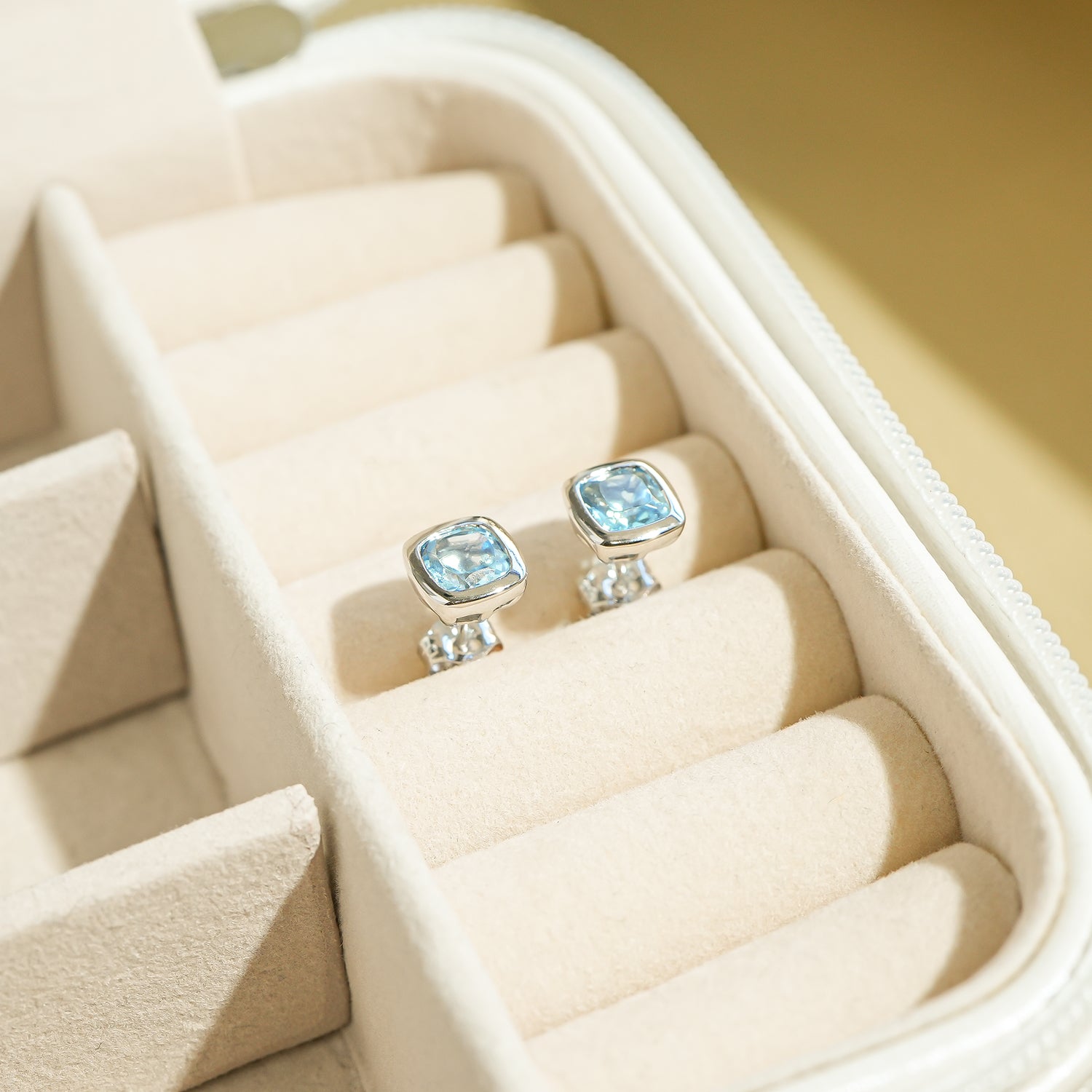 Blue Topaz Cushion Stud Earrings in Yellow Box