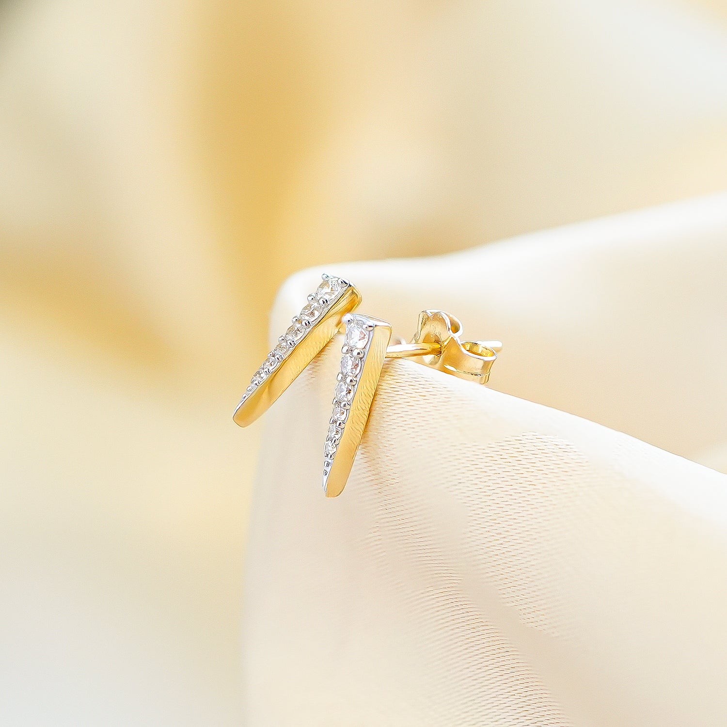 Demi Diamond Spear Stud Earrings Set On Cloth