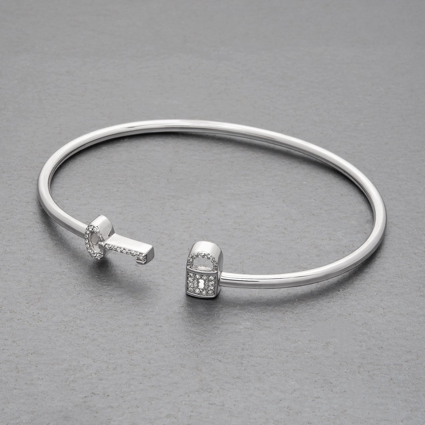 Beth Key & Lock Bangle in Silver coating