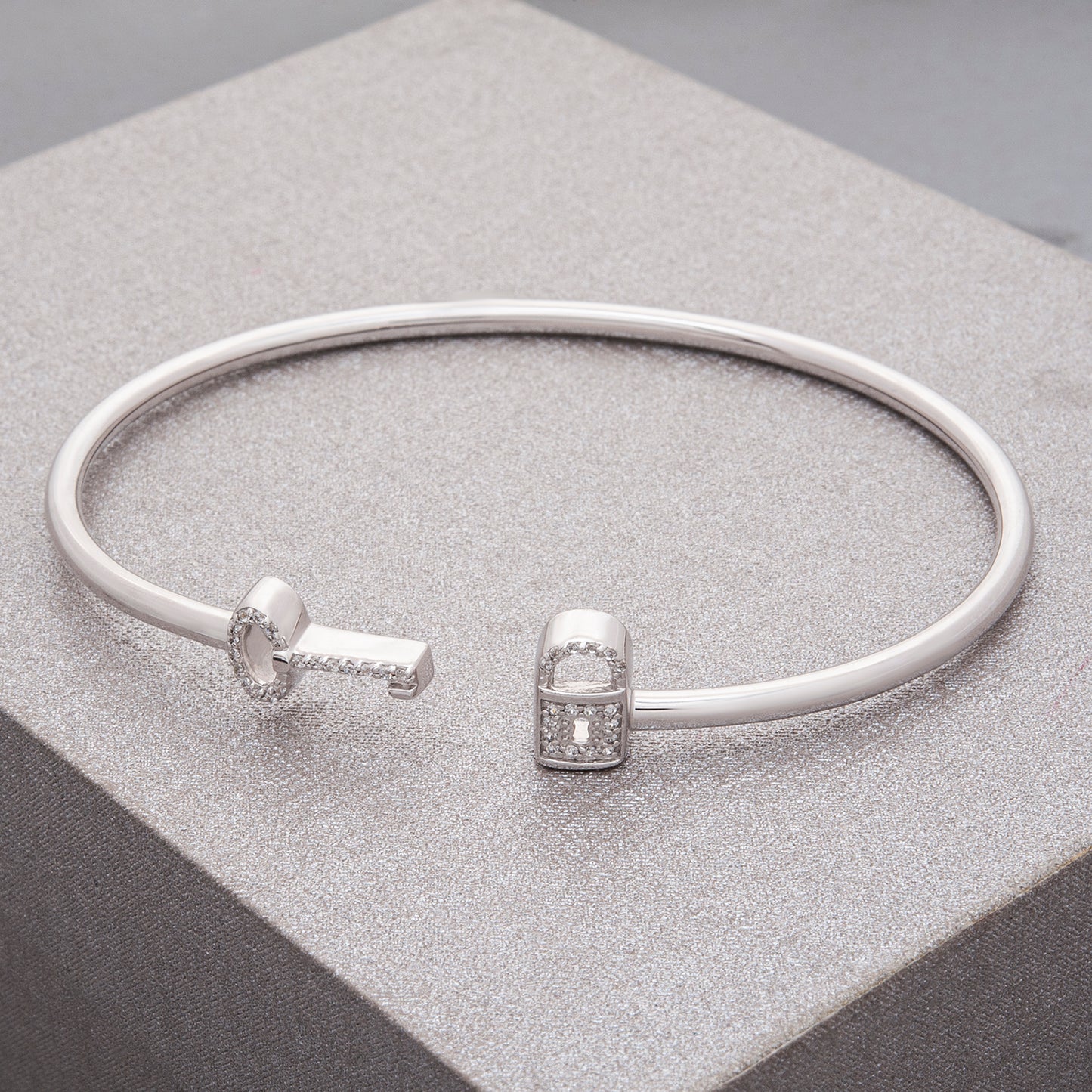 Beth Key & Lock Bangle in Silver coated