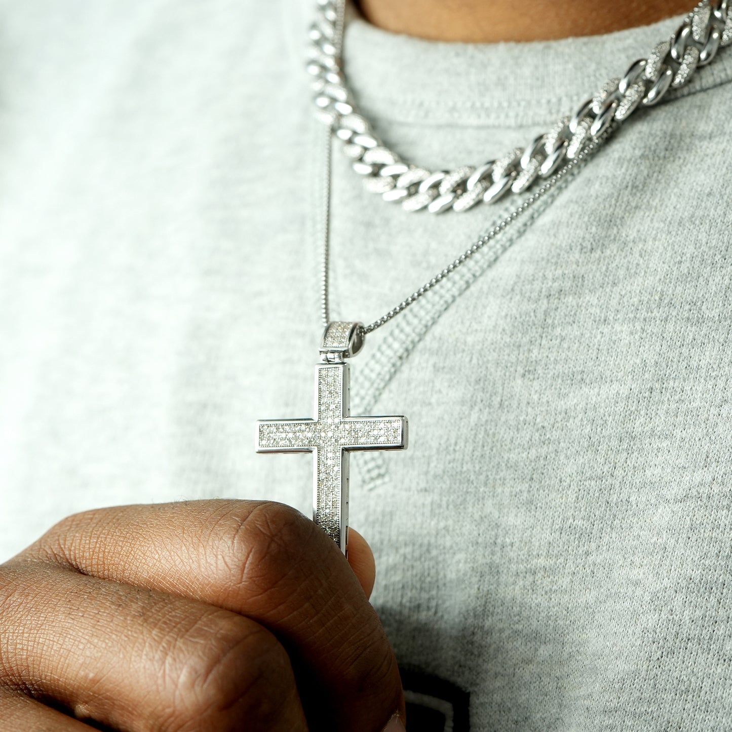 Diamond Cross Pendant on shirt