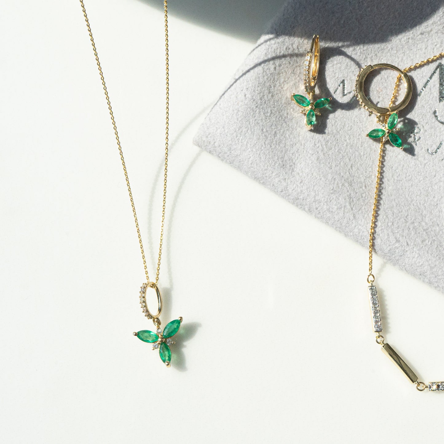 Emerald Flower & Diamond Accent Pendant From Top View