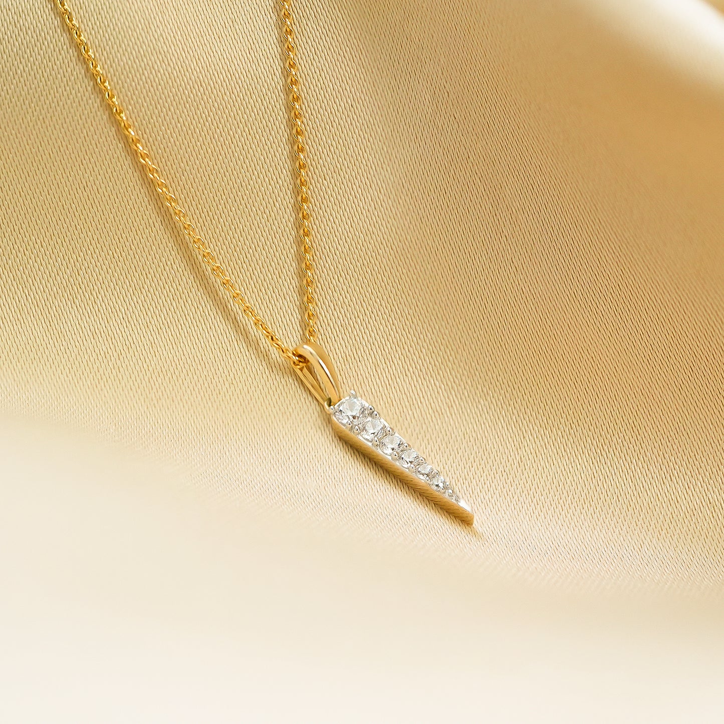 Demi Diamond Spear Pendant Placed on Cloth