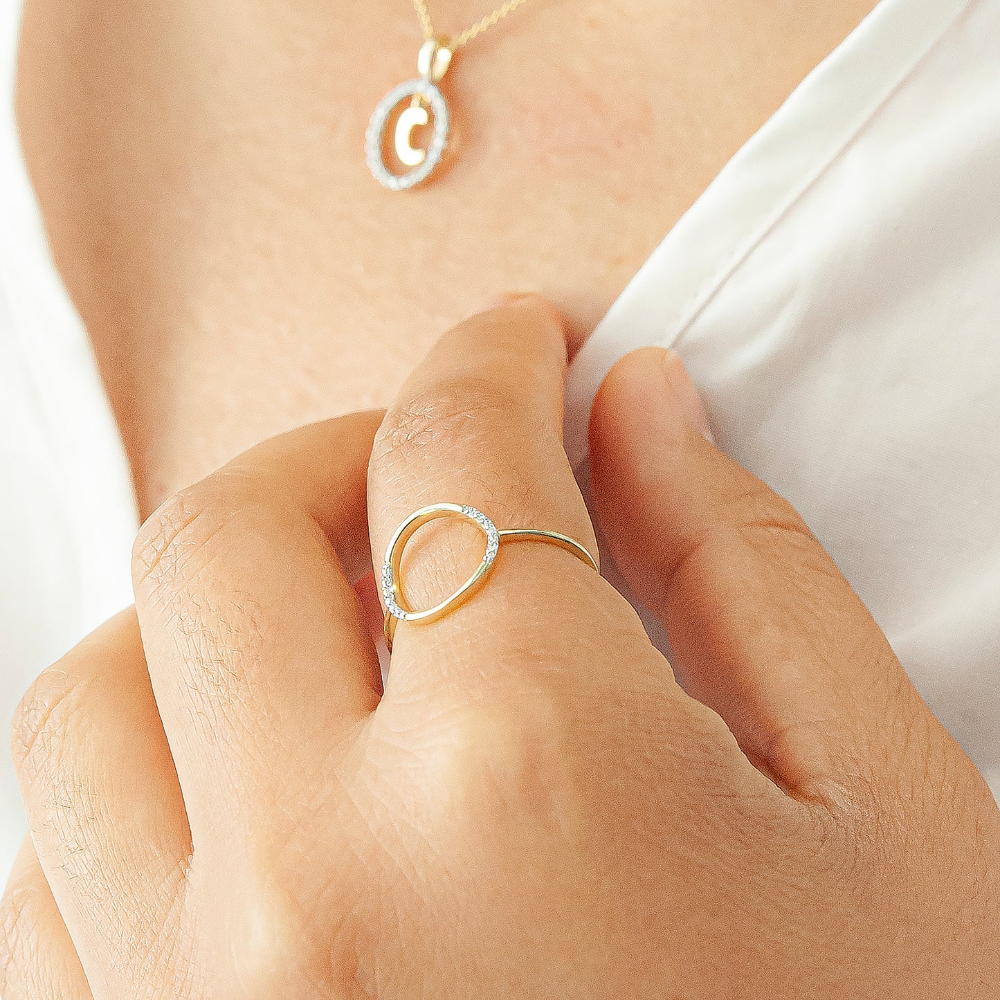 Open Circle Half Diamond Shape Ring in Yellow Gold