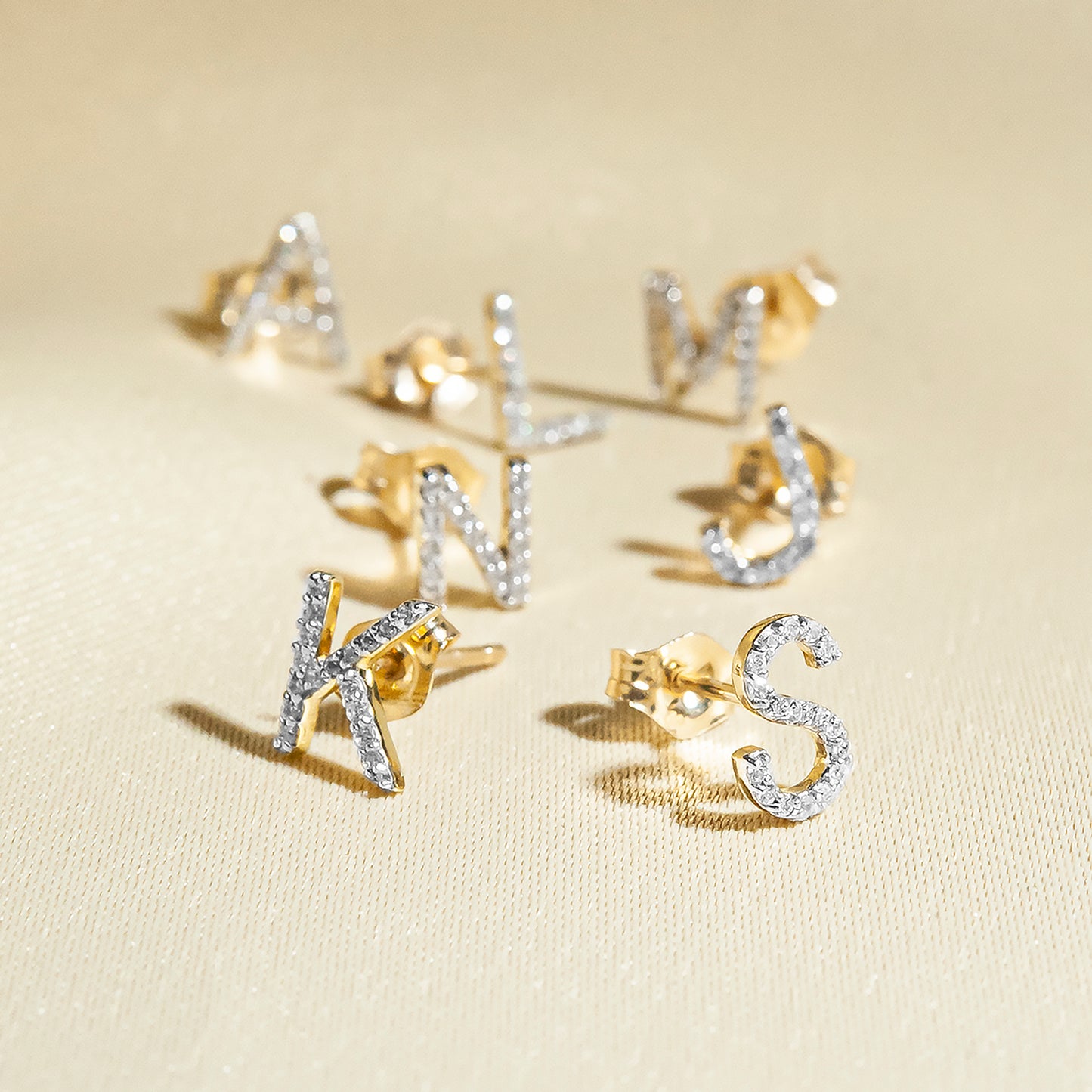 Single Initial Diamond Stud - J in Yellow Gold