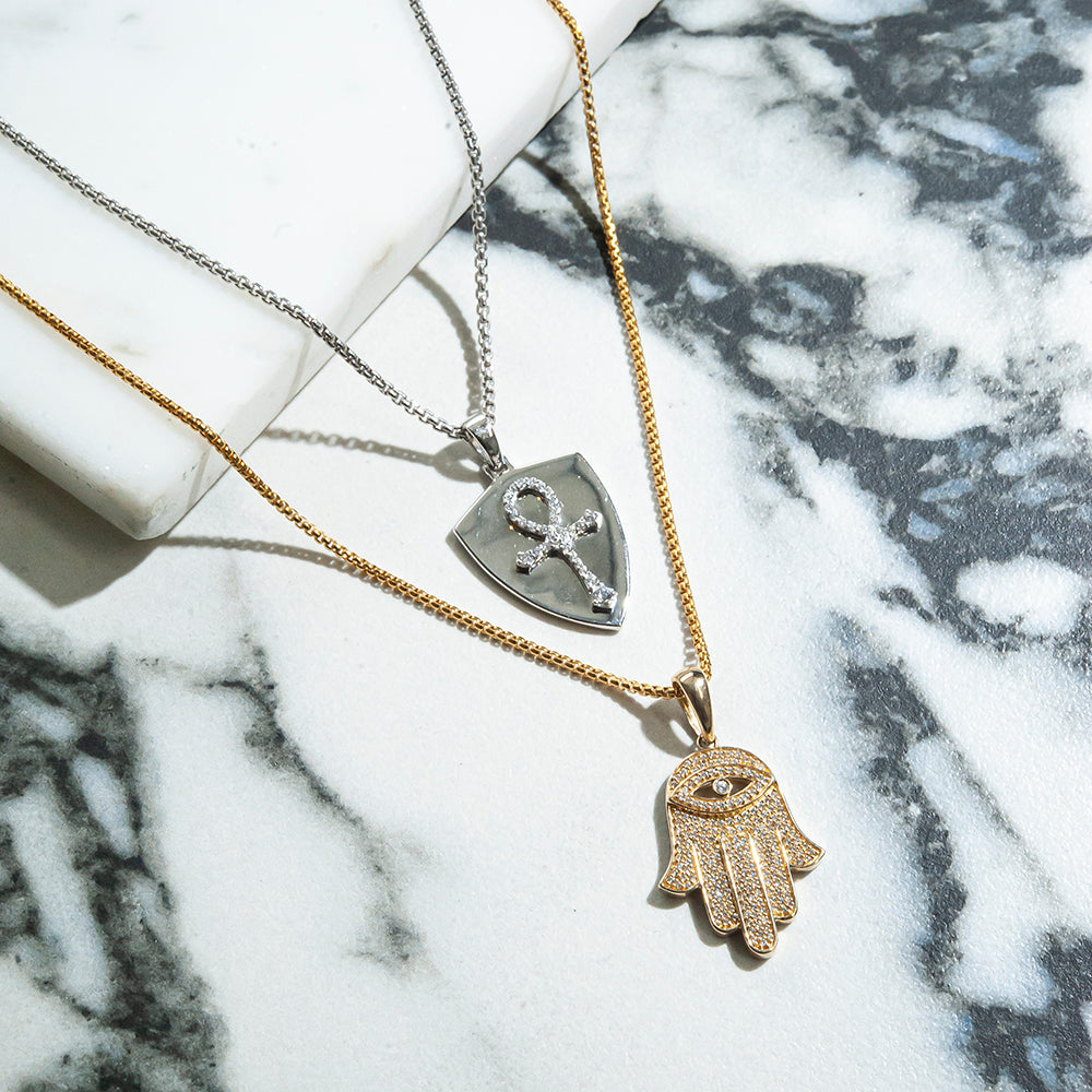 Diamond Hamsa Pendant Placed On Table