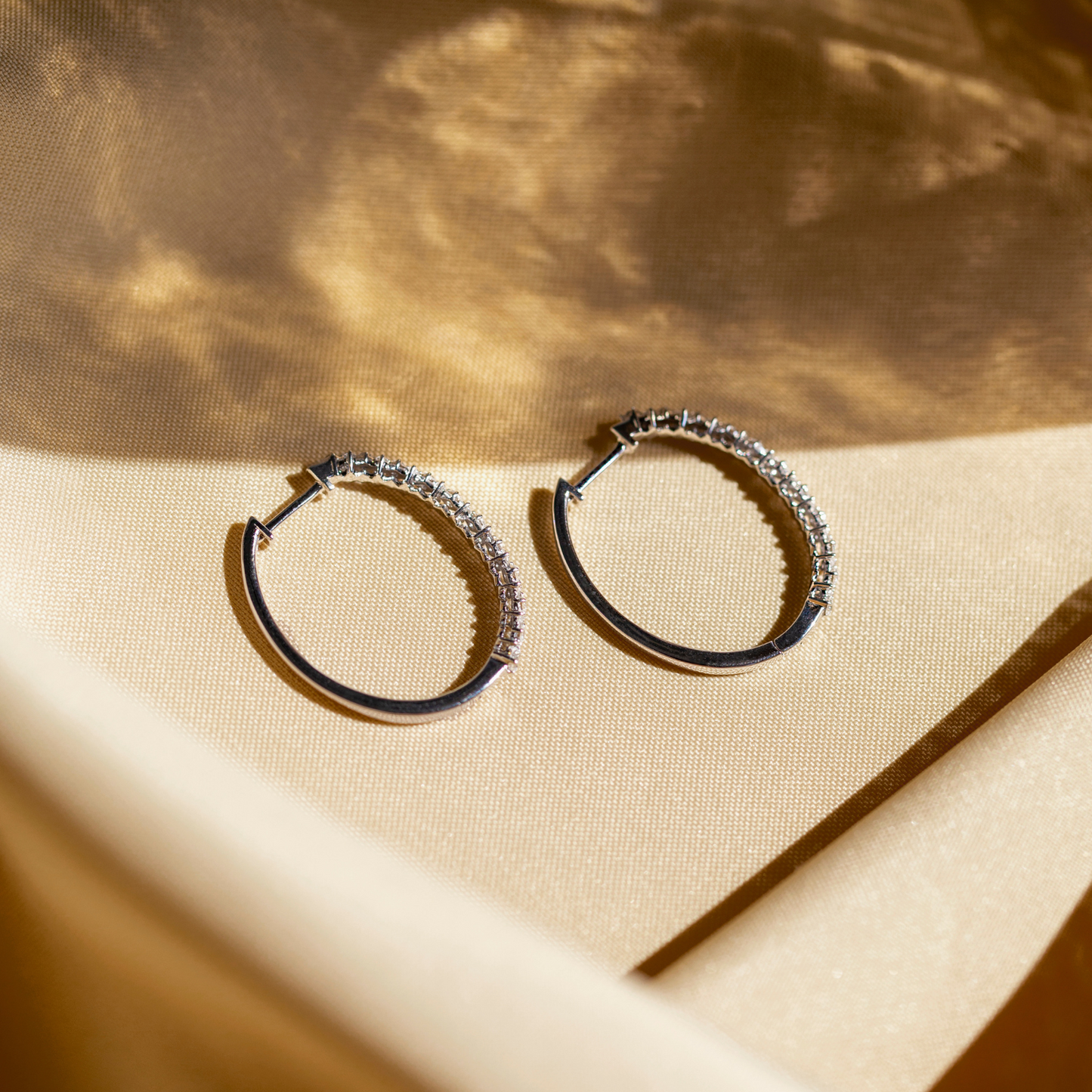 Eze Diamond Hoop Earrings In Golden Background