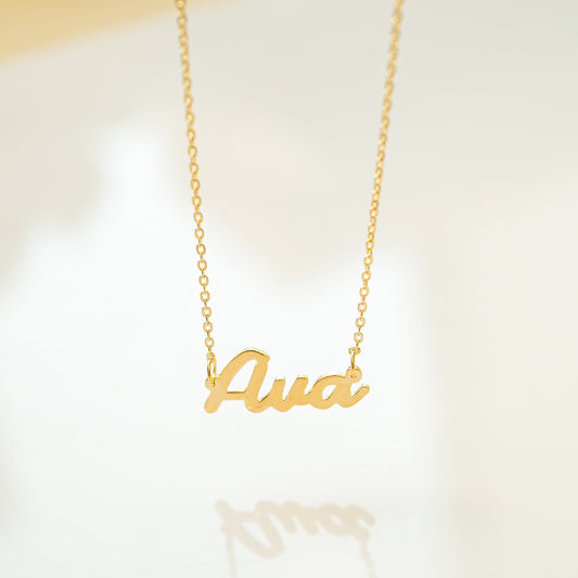 Image for Cross Jewelry, Nameplate Necklaces, & Stacked Rings: Our Favorite Jewelry Trends of 2022