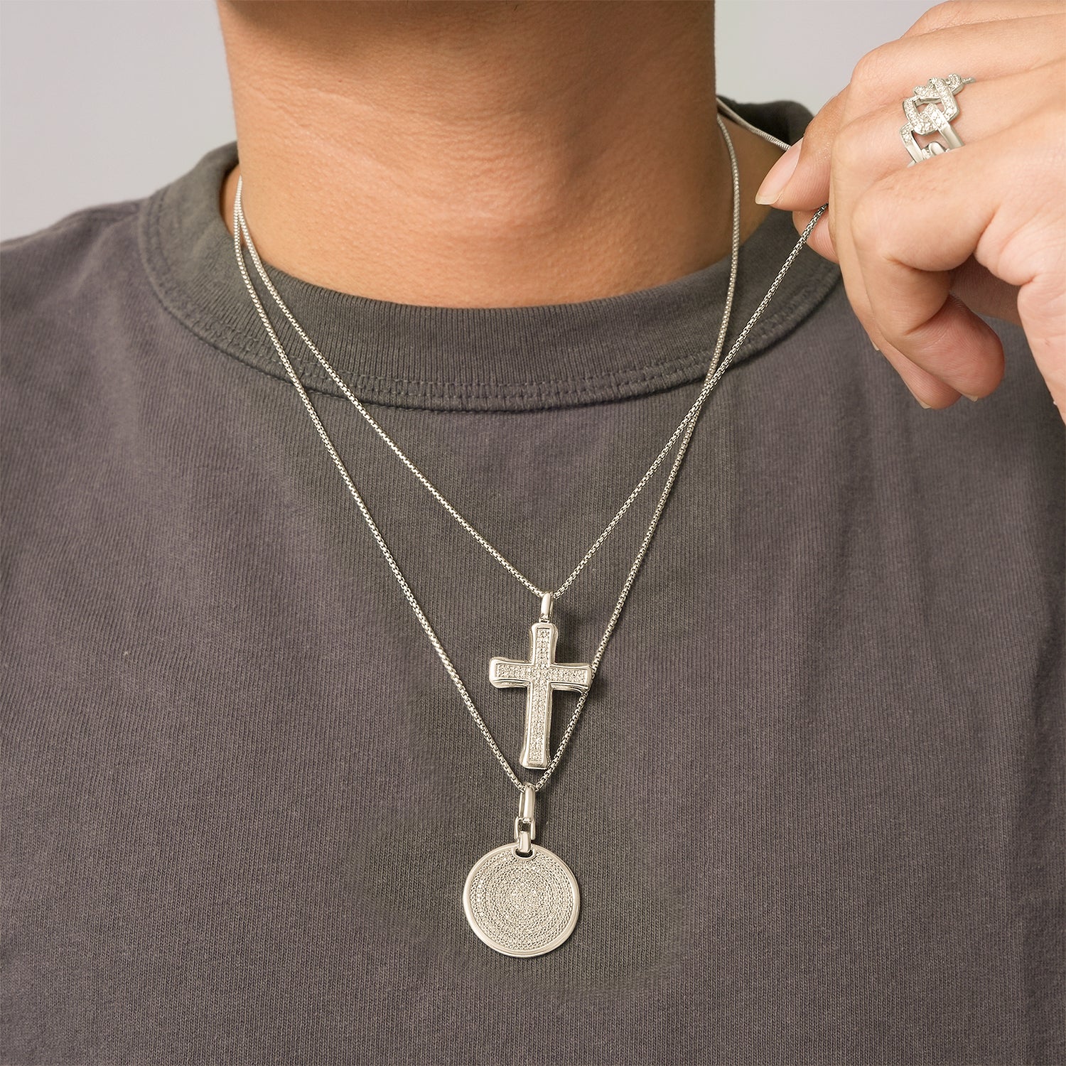 1/4 Ct. T.W Diamond Men's Cross Pendant in Sterling Silver On T-shirt