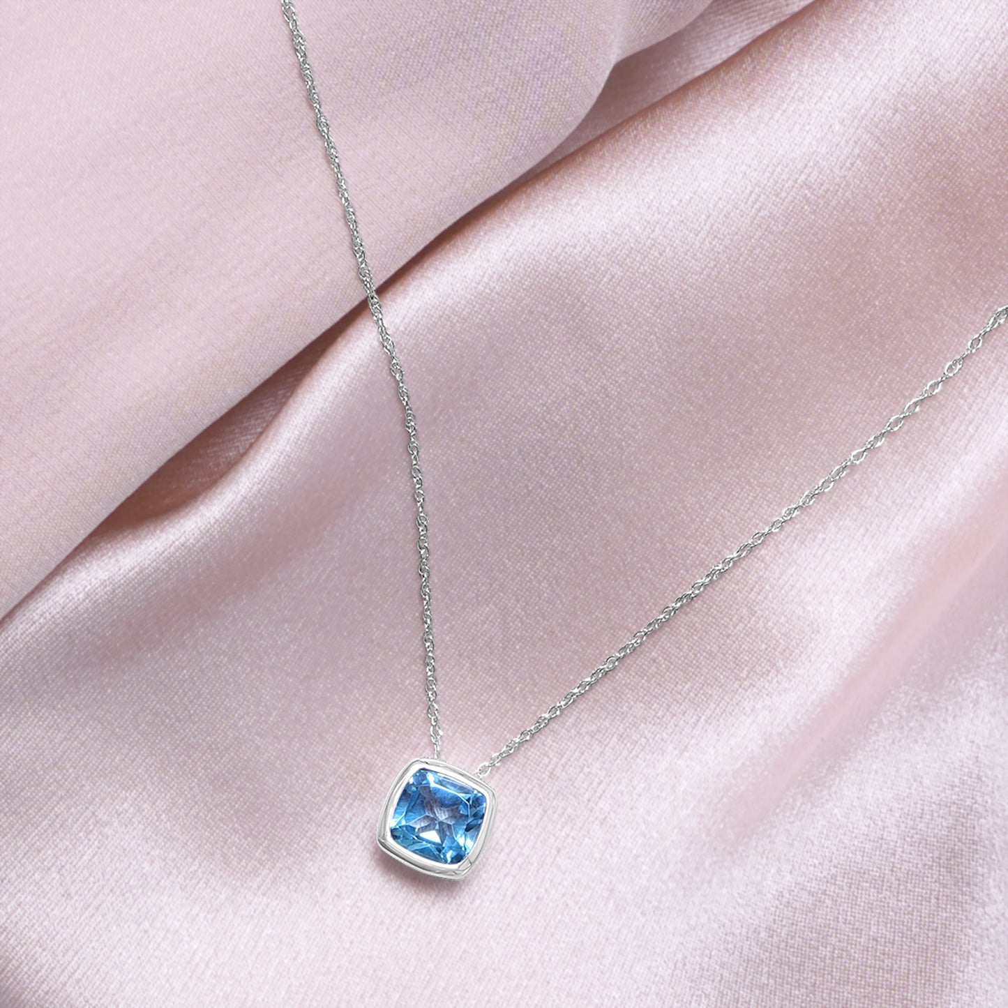 Blue topaz bezel set pendant for Neck