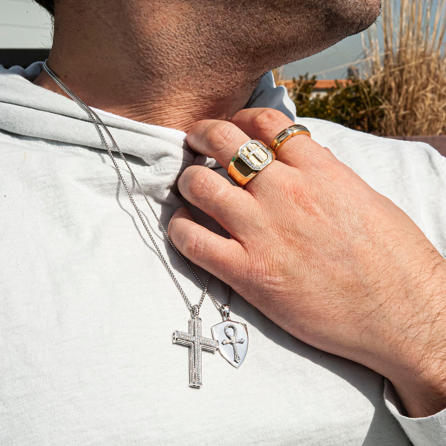 Diamond Cross Pendant Set on T-Shirt with Rings