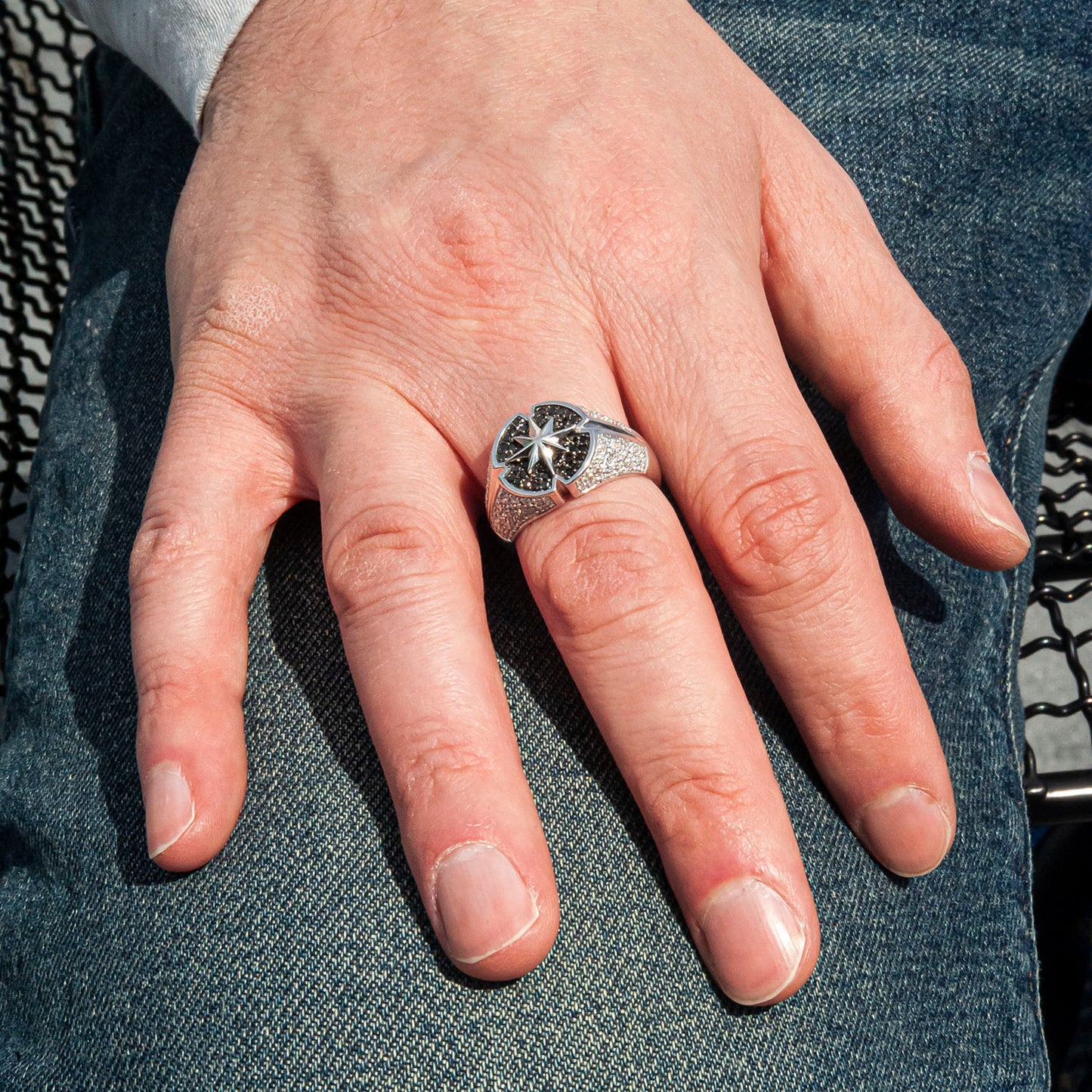 Black & White Diamond Ring in man hand