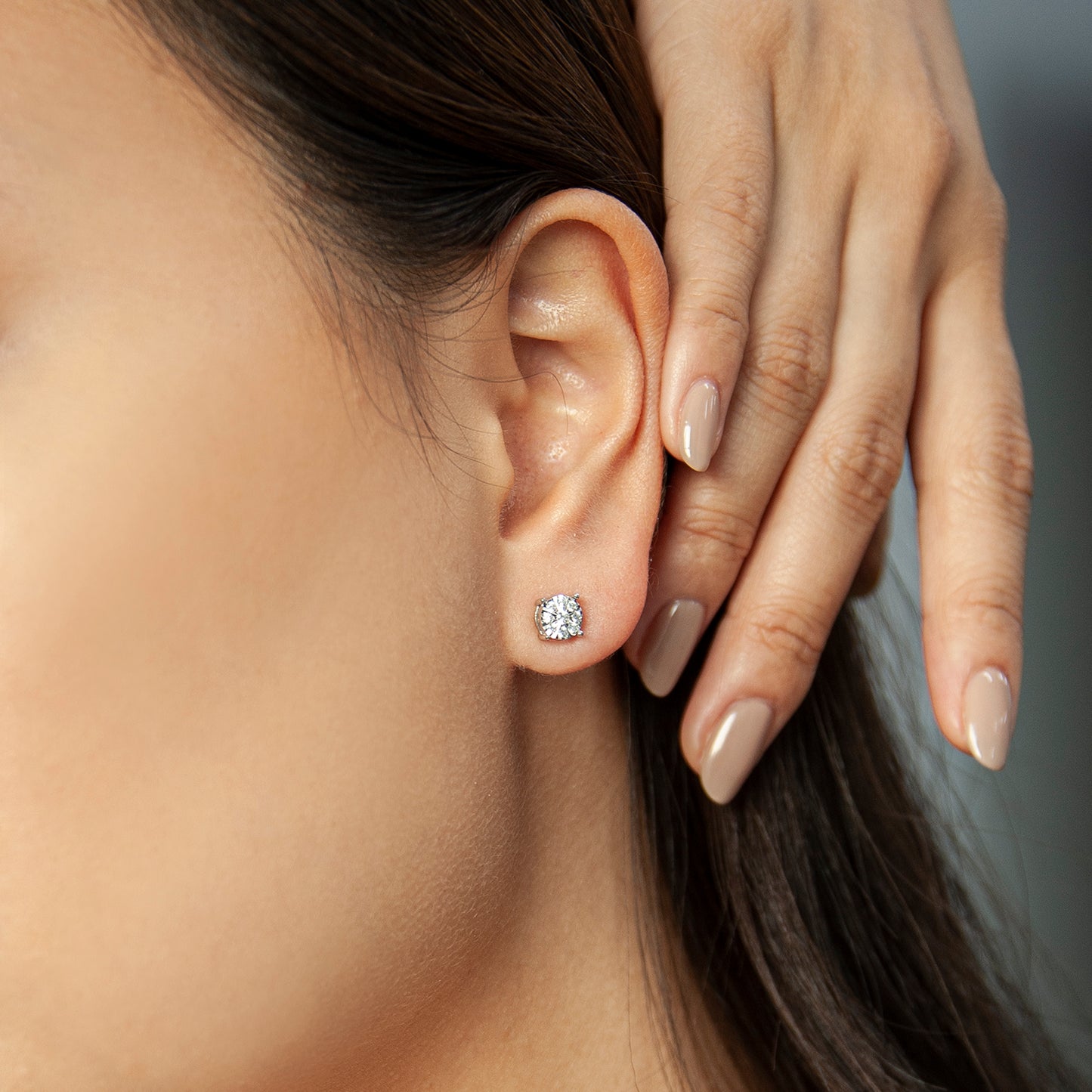 Evette Round Diamond Stud Earrings In Girl Ear