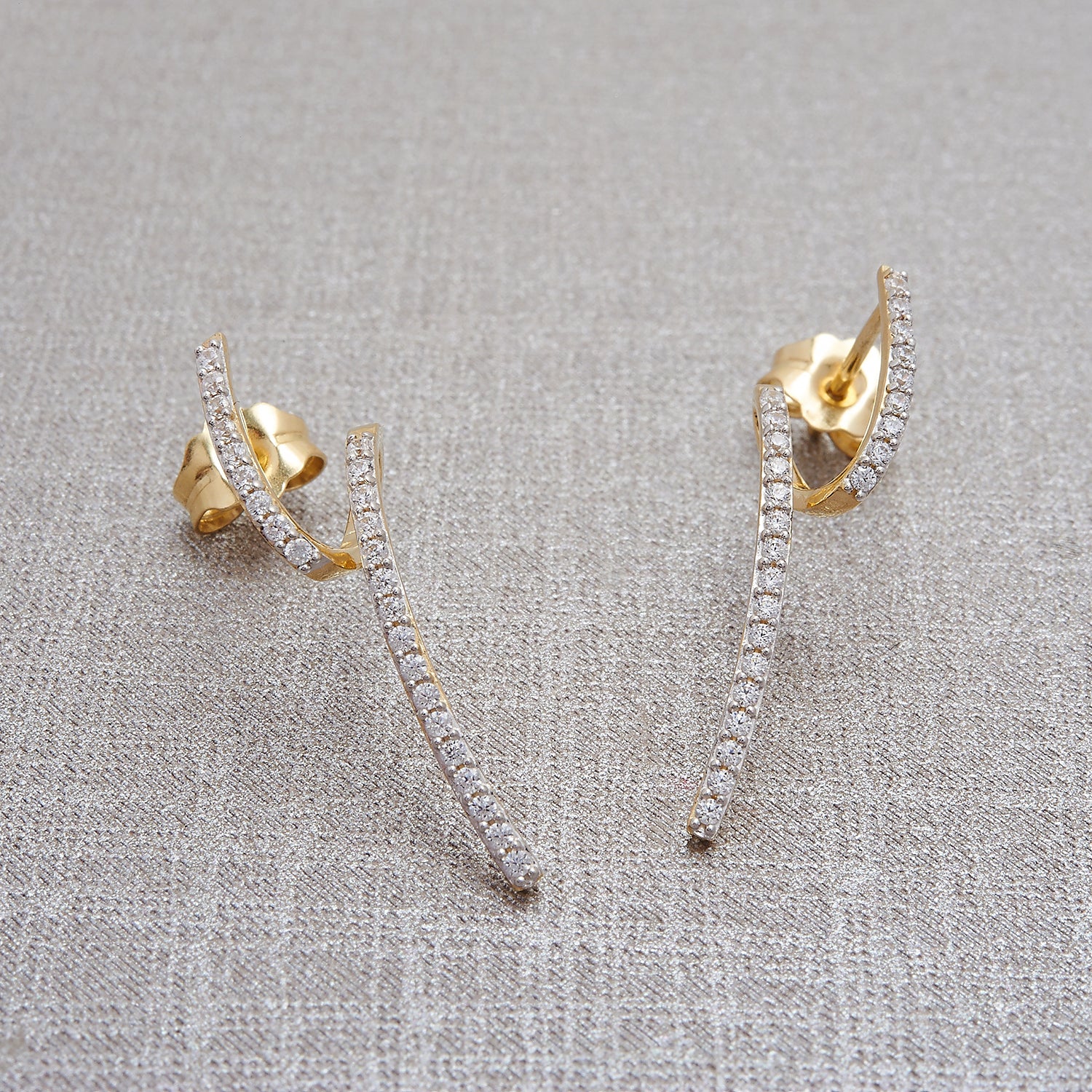Eddi Diamond Free Form Earrings Placed On Cloth