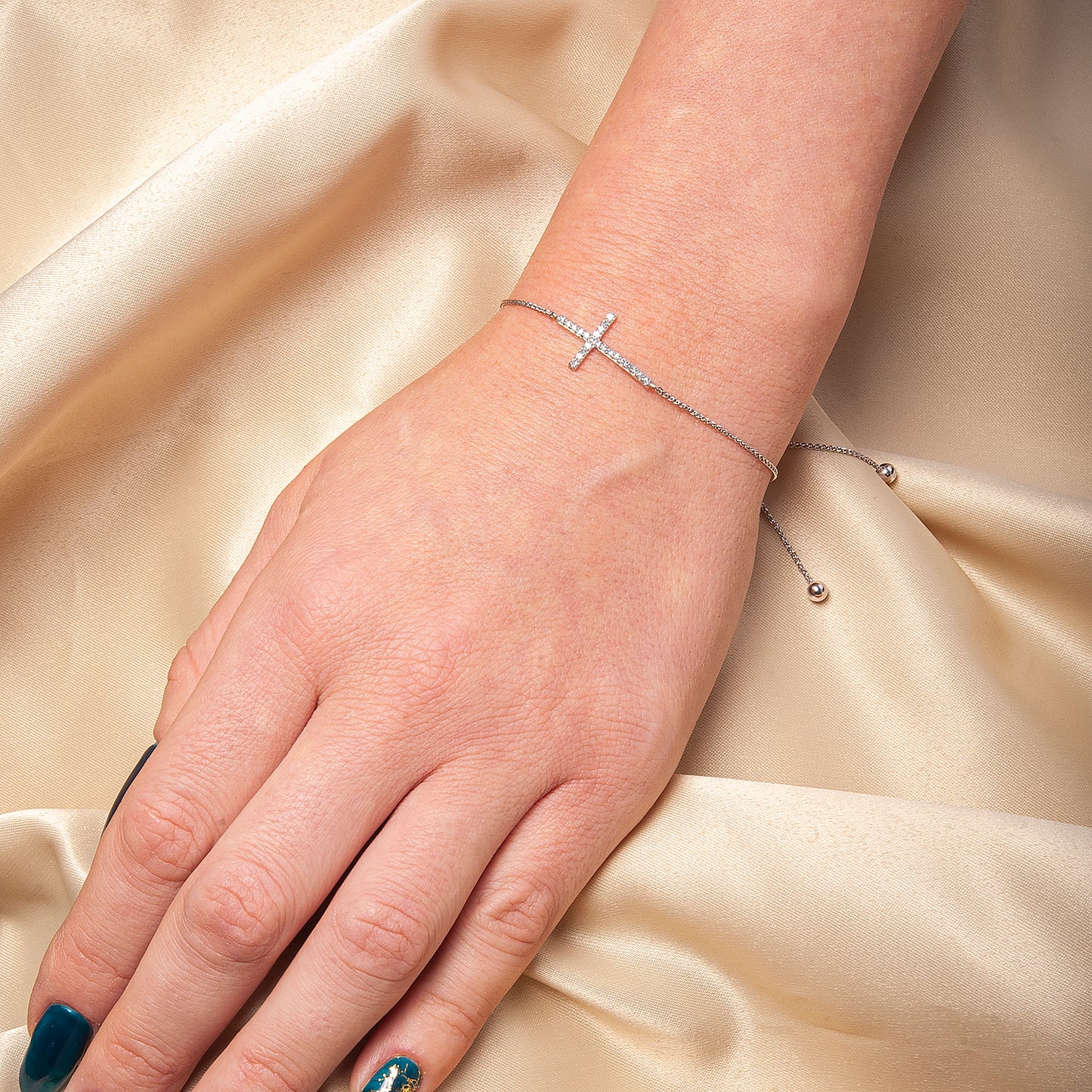 Brooke Diamond Cross Bolo Bracelet in Lady's Hand