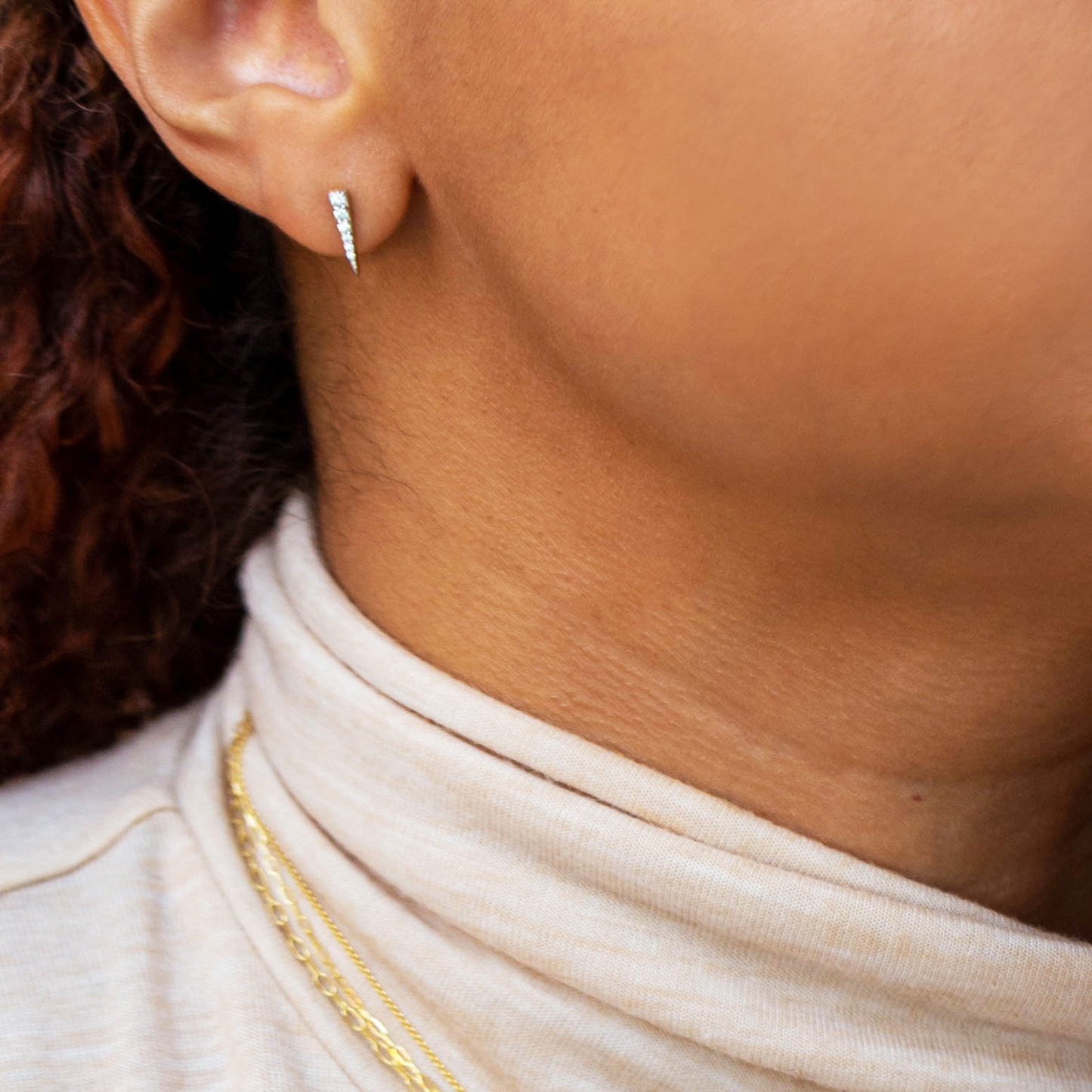 Demi Diamond Spear Stud Earrings Set On Ear